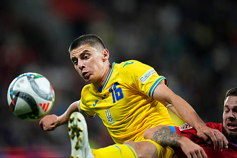 UEFA Nations League, Czech Republic vs Ukraine: Ukraine's Vitaliy Mykolenko reacts for the ball next to Czech Republic's Vasil Kusej